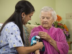 care-worker-with-elderly-woman-1200x900